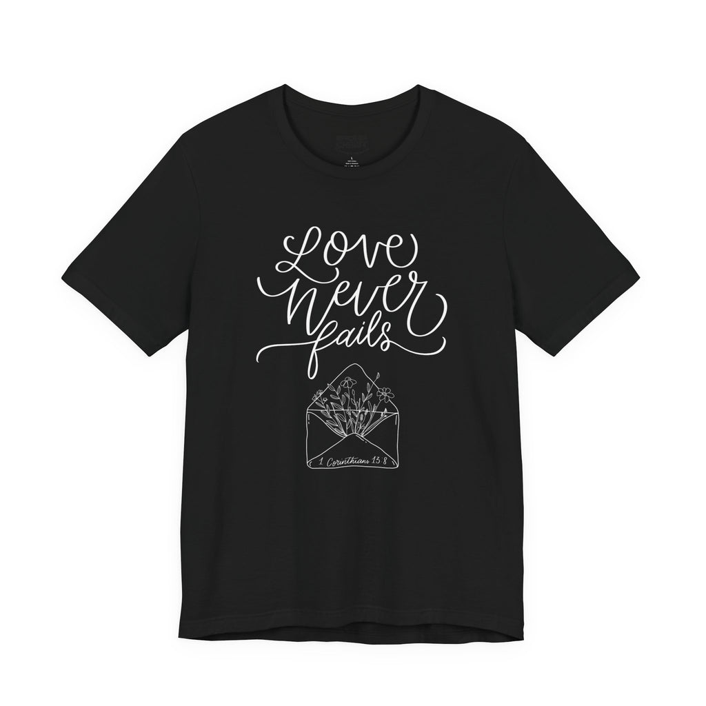 Love Never Fails - T shirt (2 colors) - white text